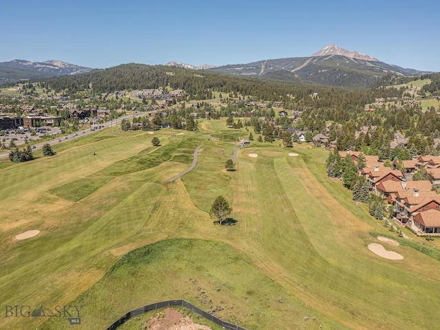 80 Crail Creek Ct Unit 616, Big Sky, MT 59716 - aerial view of property and surrounding area featuring a mountainous background and nearby suburban area