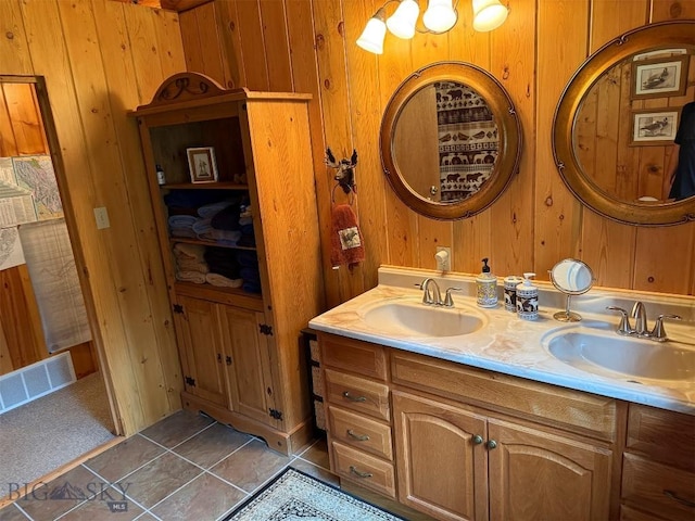 6 Arrowpoint, Silver Gate, MT 59081 - bathroom featuring wooden walls and double vanity