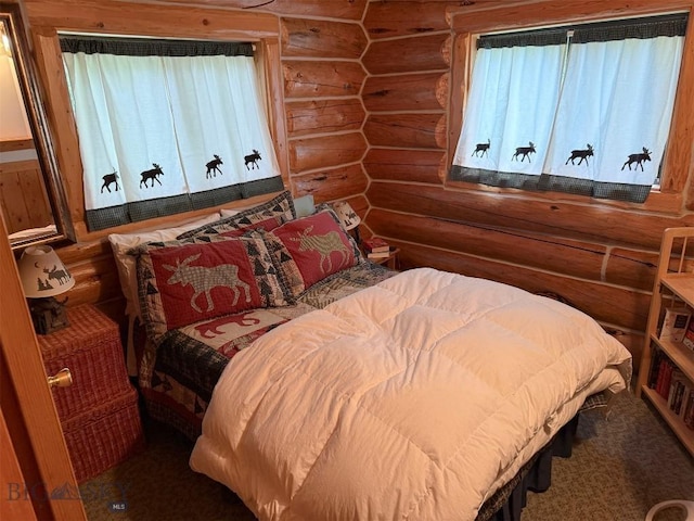6 Arrowpoint, Silver Gate, MT 59081 - bedroom with rustic walls