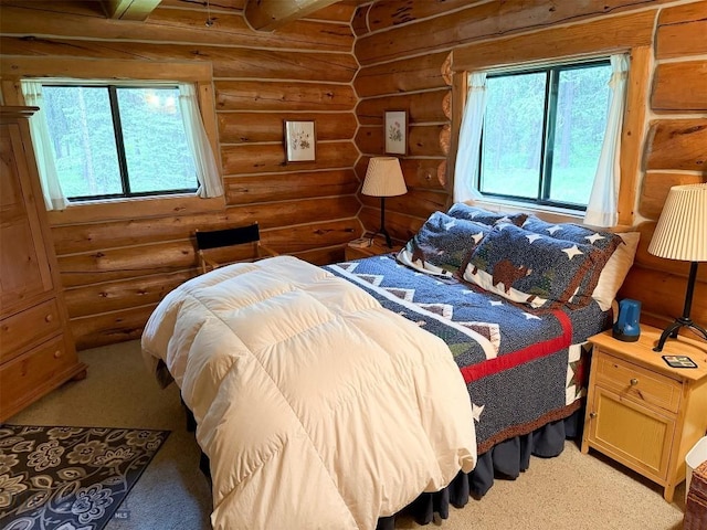 6 Arrowpoint, Silver Gate, MT 59081 - bedroom featuring rustic walls and multiple windows