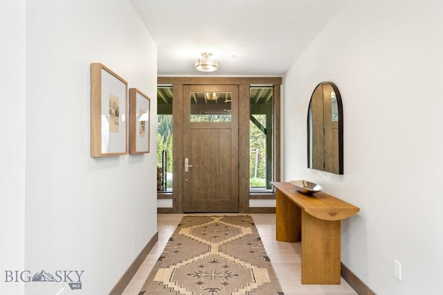 580 Outlook Trl Unit 42, Big Sky, MT 59730 - foyer entrance featuring baseboards and light wood finished floors