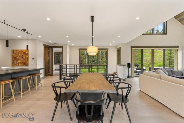 580 Outlook Trl Unit 42, Big Sky, MT 59730 - dining room with light wood-style flooring and recessed lighting