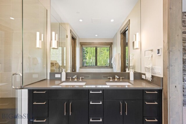 580 Outlook Trl Unit 42, Big Sky, MT 59730 - bathroom featuring double vanity and a stall shower