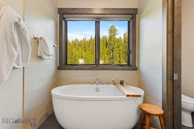 580 Outlook Trl Unit 42, Big Sky, MT 59730 - full bath with tile walls and a freestanding bath