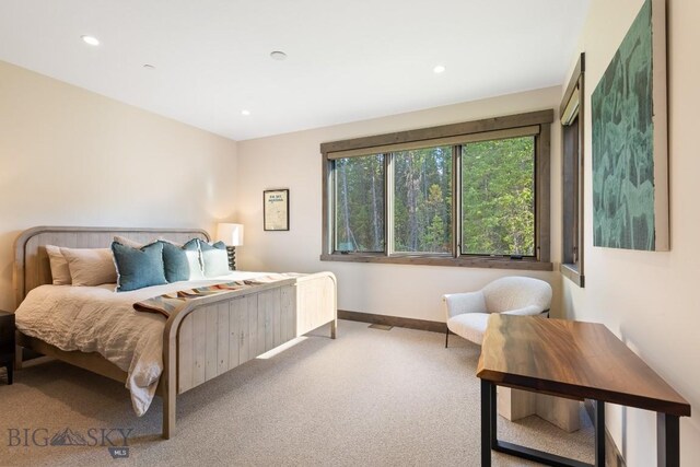 580 Outlook Trl Unit 42, Big Sky, MT 59730 - bedroom featuring carpet flooring and recessed lighting