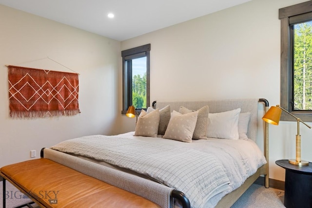 580 Outlook Trl Unit 42, Big Sky, MT 59730 - carpeted bedroom featuring recessed lighting and baseboards
