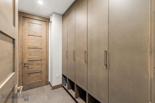 580 Outlook Trl Unit 42, Big Sky, MT 59730 - mudroom featuring baseboards