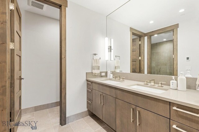 580 Outlook Trl Unit 42, Big Sky, MT 59730 - full bath featuring double vanity, tile patterned floors, tiled shower, and recessed lighting