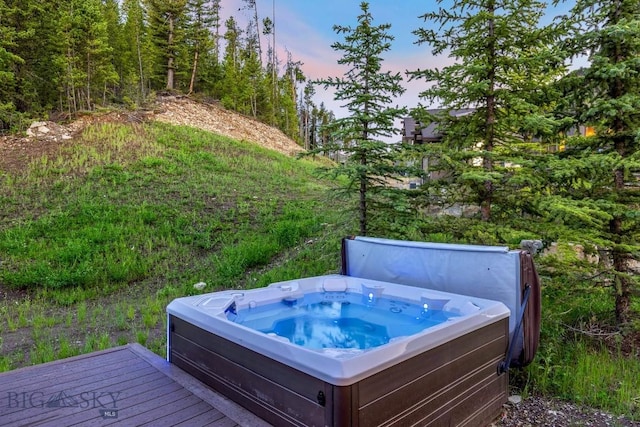 580 Outlook Trl Unit 42, Big Sky, MT 59730 - deck featuring a hot tub