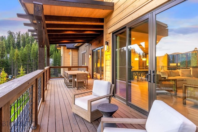 580 Outlook Trl Unit 42, Big Sky, MT 59730 - deck at dusk with outdoor dining area