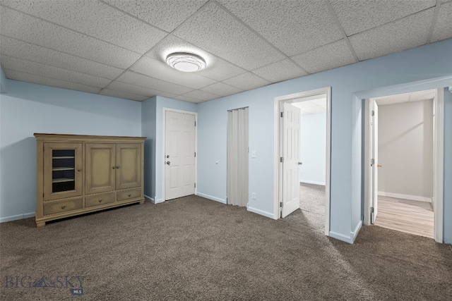 1304 Absaroka Ct, Livingston, MT 59047 - unfurnished bedroom featuring carpet flooring and a paneled ceiling