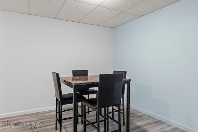 1304 Absaroka Ct, Livingston, MT 59047 - dining area featuring a drop ceiling and wood finished floors
