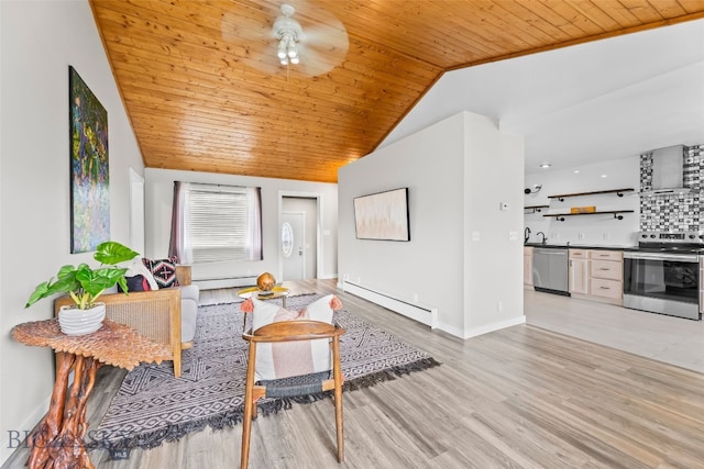 1304 Absaroka Ct, Livingston, MT 59047 - living room featuring baseboard heating, wood ceiling, vaulted ceiling, wet bar, and a ceiling fan