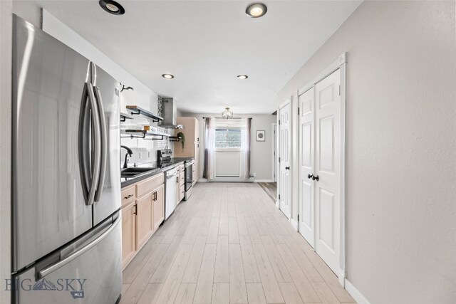 1304 Absaroka Ct, Livingston, MT 59047 - kitchen featuring stainless steel appliances, open shelves, dark countertops, recessed lighting, and light wood-style floors