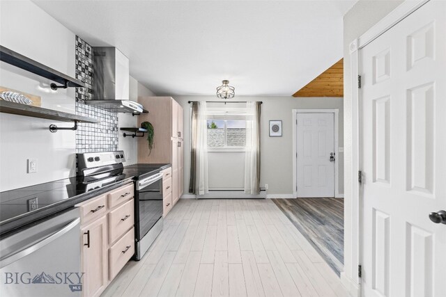 1304 Absaroka Ct, Livingston, MT 59047 - kitchen with stainless steel appliances, open shelves, island exhaust hood, light wood finished floors, and a baseboard heating unit