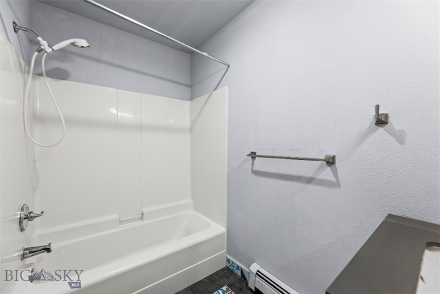 1304 Absaroka Ct, Livingston, MT 59047 - full bathroom featuring washtub / shower combination, a baseboard heating unit, and a textured wall