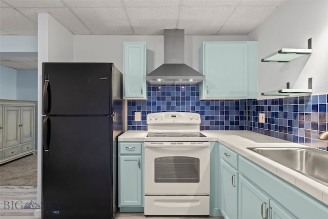 1304 Absaroka Ct, Livingston, MT 59047 - kitchen featuring freestanding refrigerator, wall chimney range hood, white electric stove, a drop ceiling, and open shelves