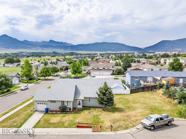 1304 Absaroka Ct, Livingston, MT 59047 - aerial perspective of suburban area with a mountain backdrop