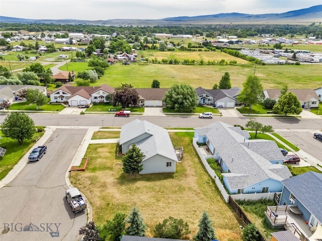 1304 Absaroka Ct, Livingston, MT 59047 - aerial perspective of suburban area with a mountainous background