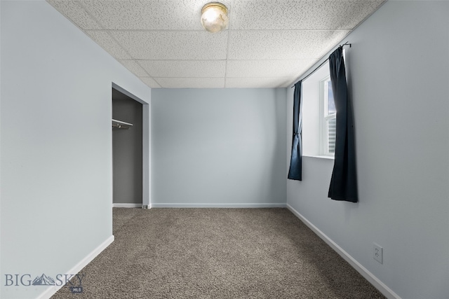 1304 Absaroka Ct, Livingston, MT 59047 - unfurnished bedroom with a paneled ceiling, carpet flooring, and a closet