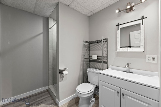 1304 Absaroka Ct, Livingston, MT 59047 - full bath with a stall shower, wood finished floors, vanity, and a paneled ceiling