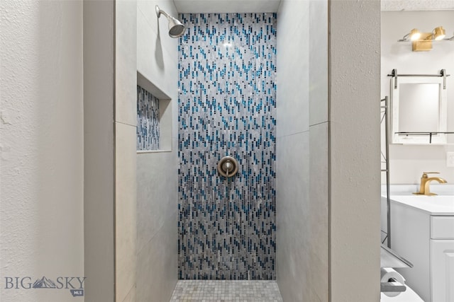 1304 Absaroka Ct, Livingston, MT 59047 - full bathroom featuring a tile shower and vanity