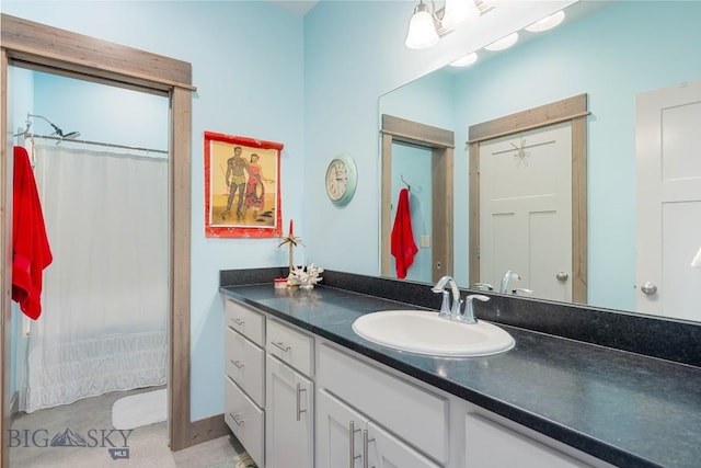182 Snowy Owl Trl, Bozeman, MT 59718 - bathroom featuring vanity and a shower with shower curtain
