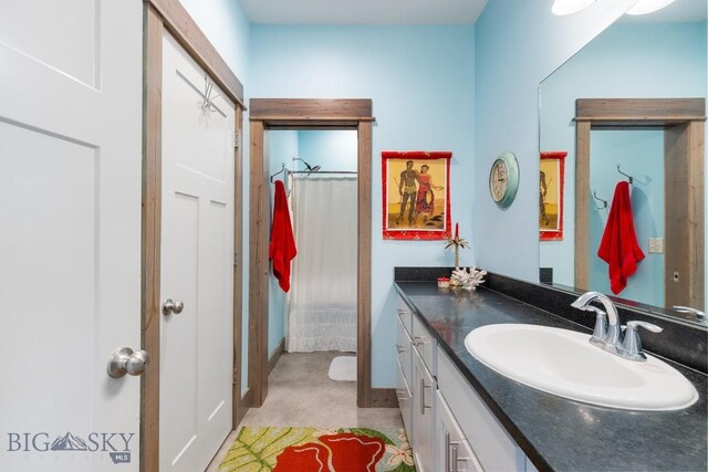 182 Snowy Owl Trl, Bozeman, MT 59718 - bathroom featuring vanity and a shower with curtain