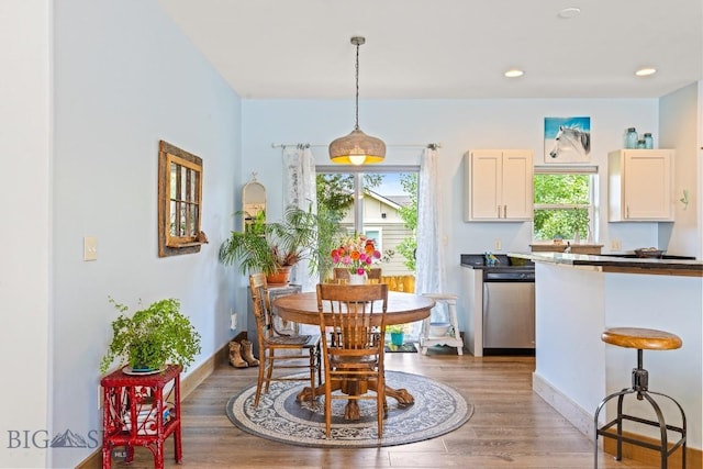 182 Snowy Owl Trl, Bozeman, MT 59718 - dining space featuring plenty of natural light, light wood-style floors, and recessed lighting