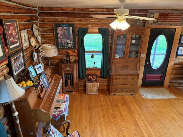 185 Howie Rd, Big Timber, MT 59011 - entryway with light wood-style flooring, ceiling fan, healthy amount of natural light, and rustic walls