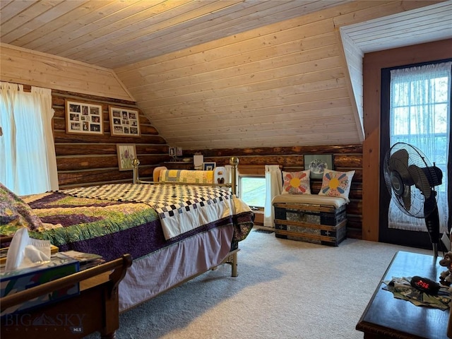 185 Howie Rd, Big Timber, MT 59011 - carpeted bedroom featuring log walls, wood ceiling, multiple windows, and vaulted ceiling