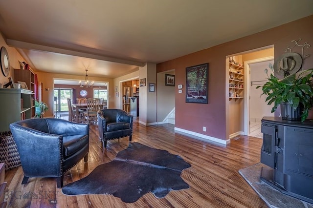 302 Ordway St S, Wilsall, MT 59086 - living area with a chandelier and wood finished floors