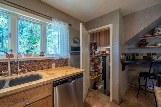 302 Ordway St S, Wilsall, MT 59086 - kitchen with dishwasher, backsplash, and butcher block counters