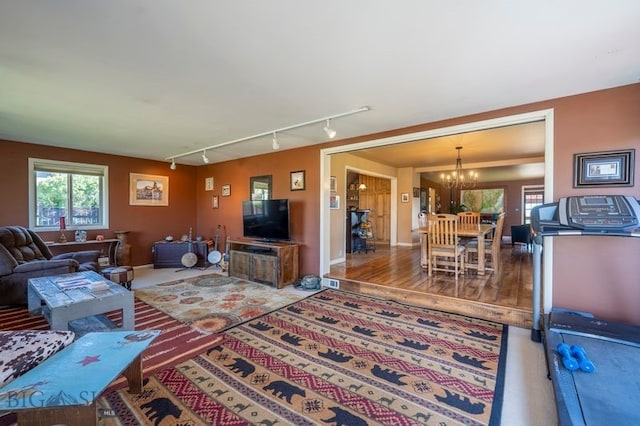 302 Ordway St S, Wilsall, MT 59086 - living area featuring a chandelier and track lighting