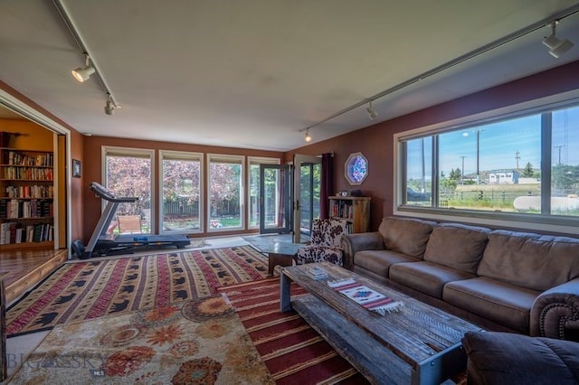 302 Ordway St S, Wilsall, MT 59086 - living area with rail lighting and plenty of natural light
