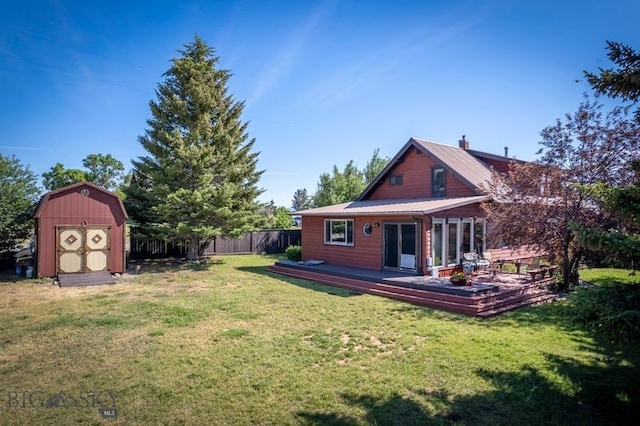 302 Ordway St S, Wilsall, MT 59086 - rear view of property featuring a shed, a deck, and a chimney