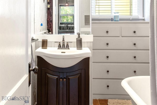 221 E Front, Butte, MT 59701 - bathroom with vanity and tile patterned flooring