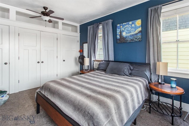 221 E Front, Butte, MT 59701 - carpeted bedroom with multiple windows and a closet