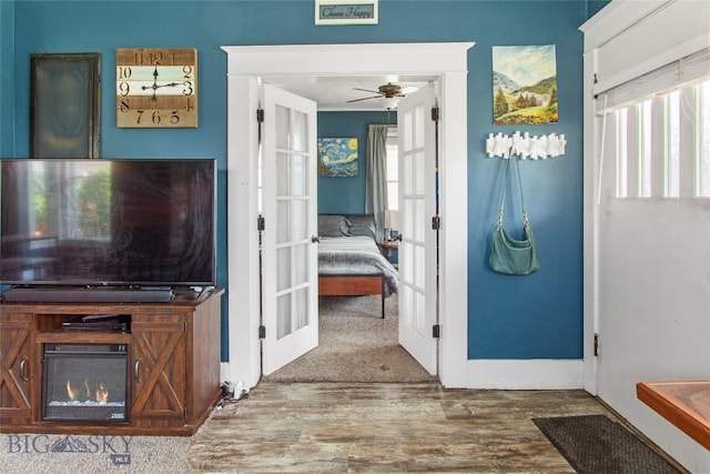221 E Front, Butte, MT 59701 - foyer with wood finished floors, french doors, and a ceiling fan