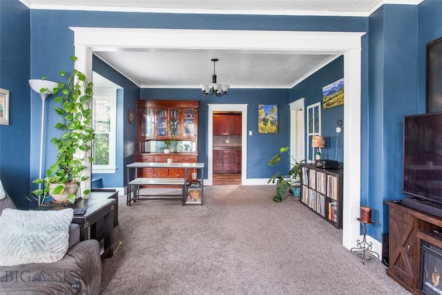 221 E Front, Butte, MT 59701 - carpeted living area with a chandelier and ornamental molding