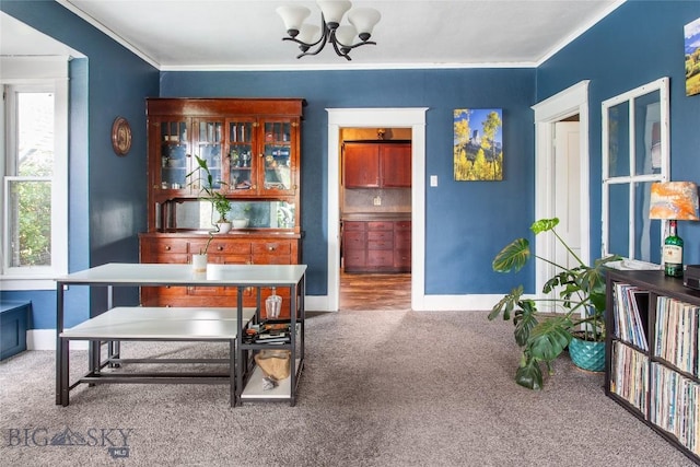 221 E Front, Butte, MT 59701 - carpeted dining room with a chandelier and ornamental molding
