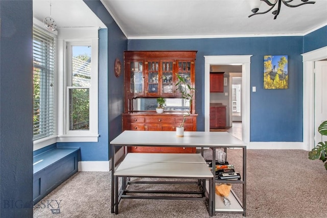 221 E Front, Butte, MT 59701 - dining room with carpet flooring, ornamental molding, and a chandelier