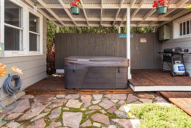 221 E Front, Butte, MT 59701 - view of patio / terrace with a hot tub, area for grilling, and a deck
