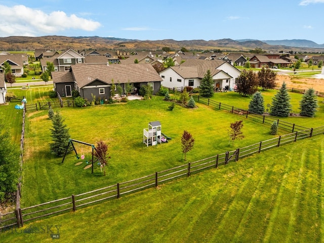 138 E Shade Tree Ln, Manhattan, MT 59741 - aerial perspective of suburban area with a mountain backdrop