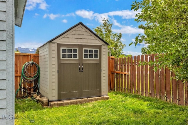 718 W Front, Livingston, MT 59047 - view of shed with a fenced backyard