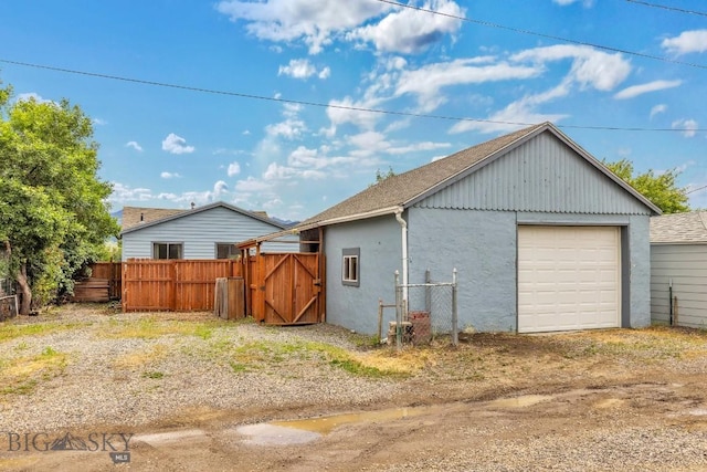 718 W Front, Livingston, MT 59047 - detached garage with a gate and driveway