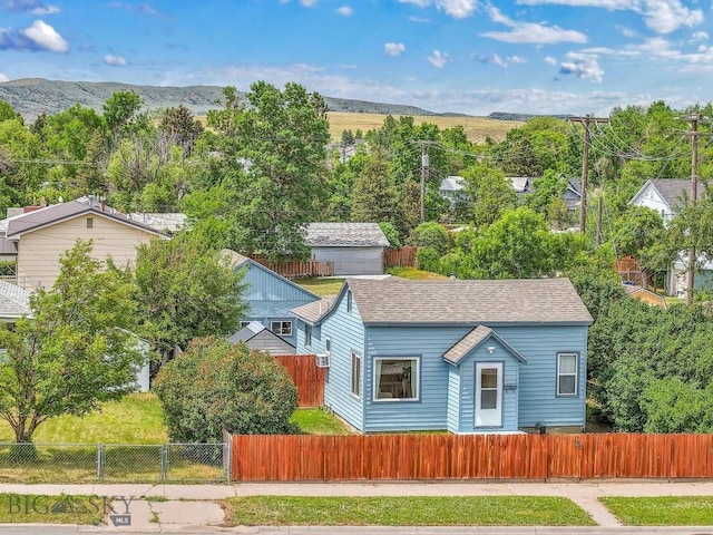 718 W Front, Livingston, MT 59047 - view of front of property featuring a fenced front yard and a mountain view