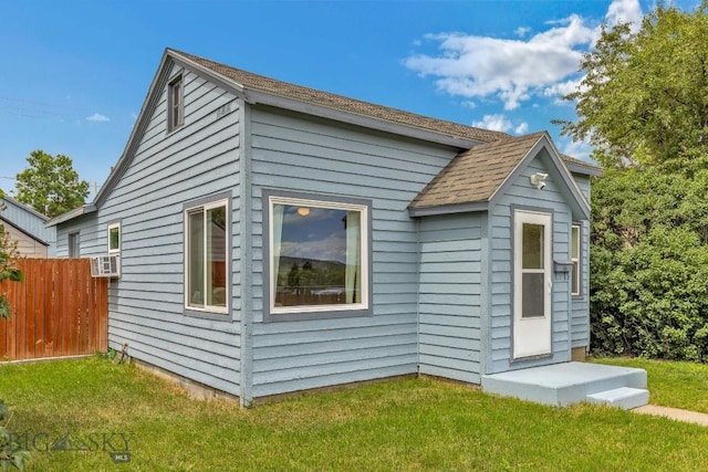 718 W Front, Livingston, MT 59047 - view of side of home featuring a shingled roof