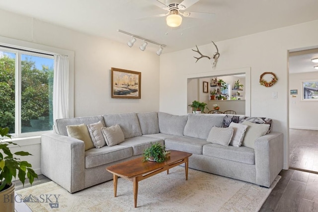 718 W Front, Livingston, MT 59047 - living area with wood finished floors, ceiling fan, and track lighting