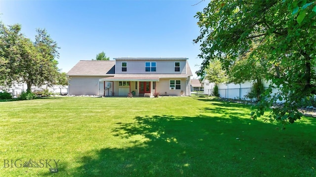 1008 E Missoula, Belgrade, MT 59714 - back of house featuring a fenced backyard